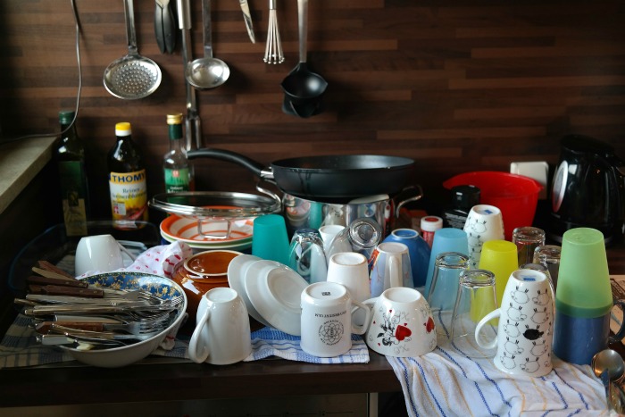 Learning how to wash dishes by hand isn’t difficult, especially with this step-by-step process!