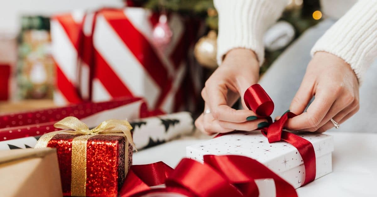 Woman wraps Christmas gifts
