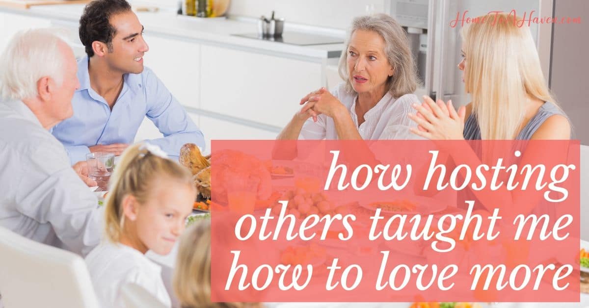 Family sits around dinner table