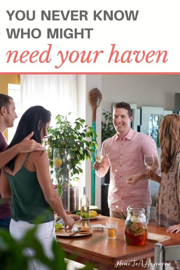 Friends gather around kitchen island