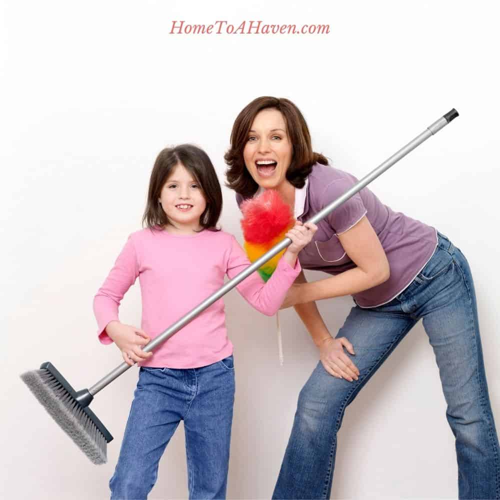 Mom and daughter get ready to dust and sweep